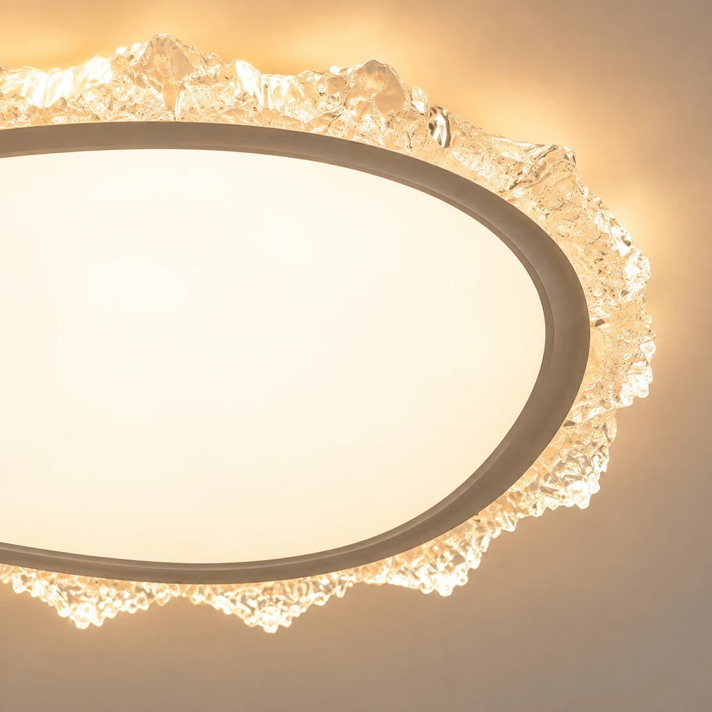 Close detail of sand-white diffuser and slim metal ring