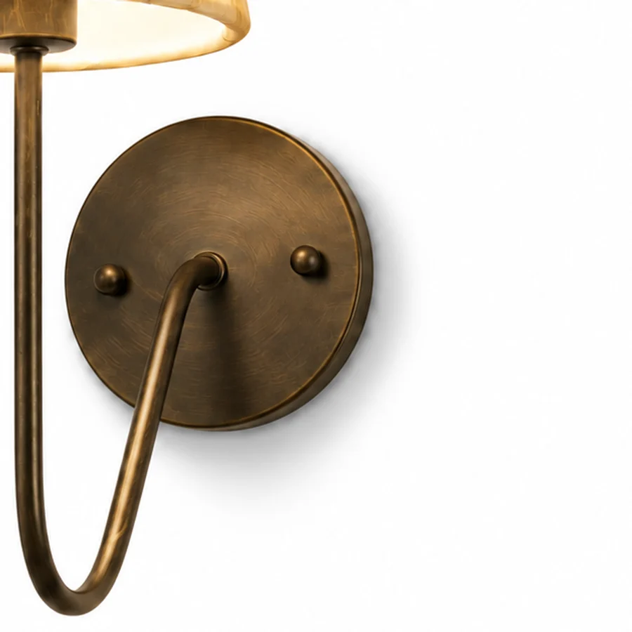 Vintage gold circular wall plate and curved arm