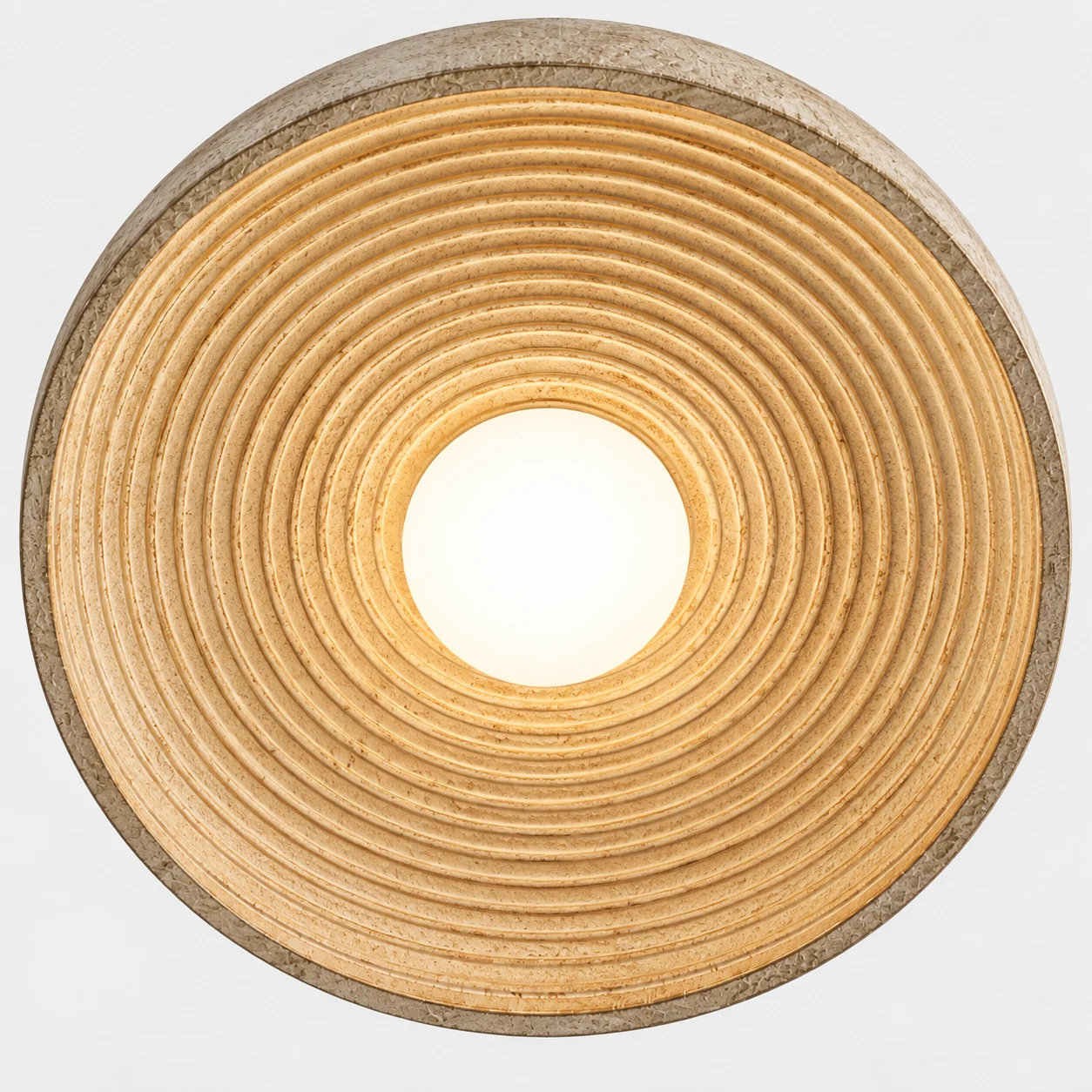 Ribbed underside and central diffuser of the Clara ceiling light
