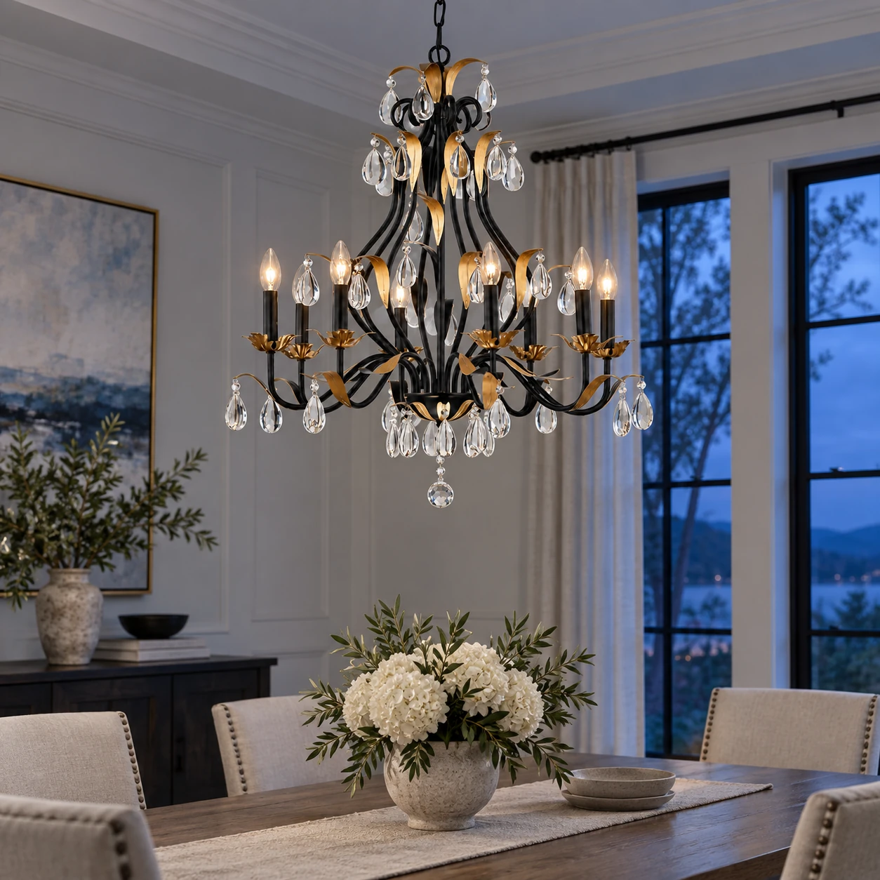 Eight-light dining room chandelier illuminated at blue hour