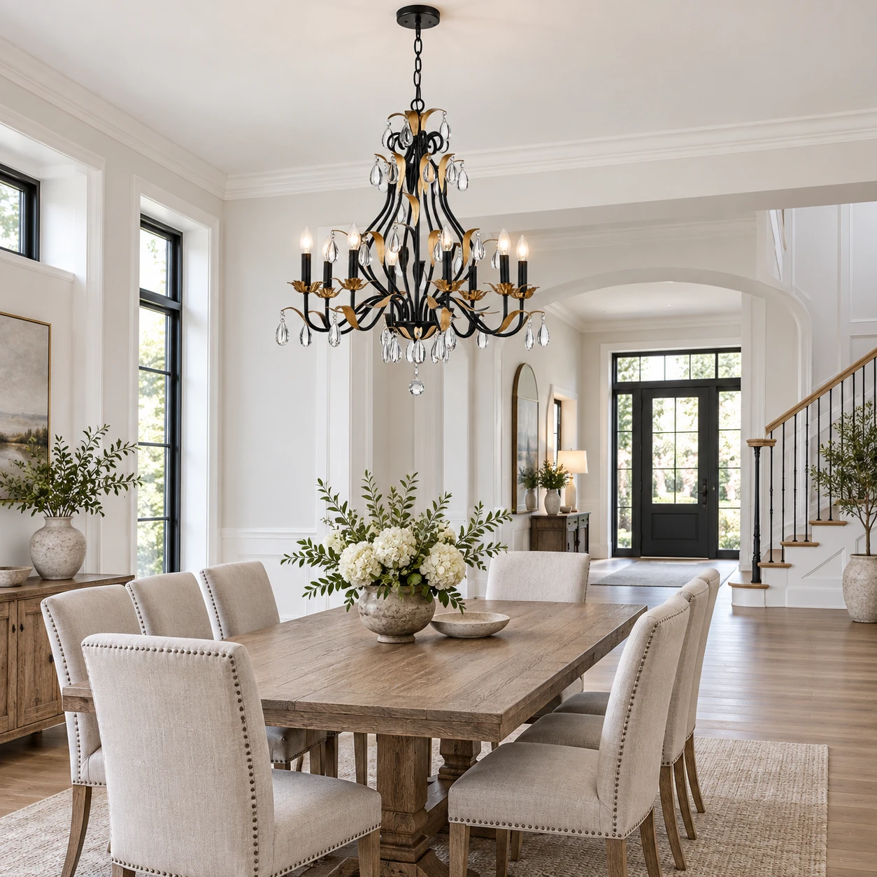 Dining room chandelier above a table in a bright interior