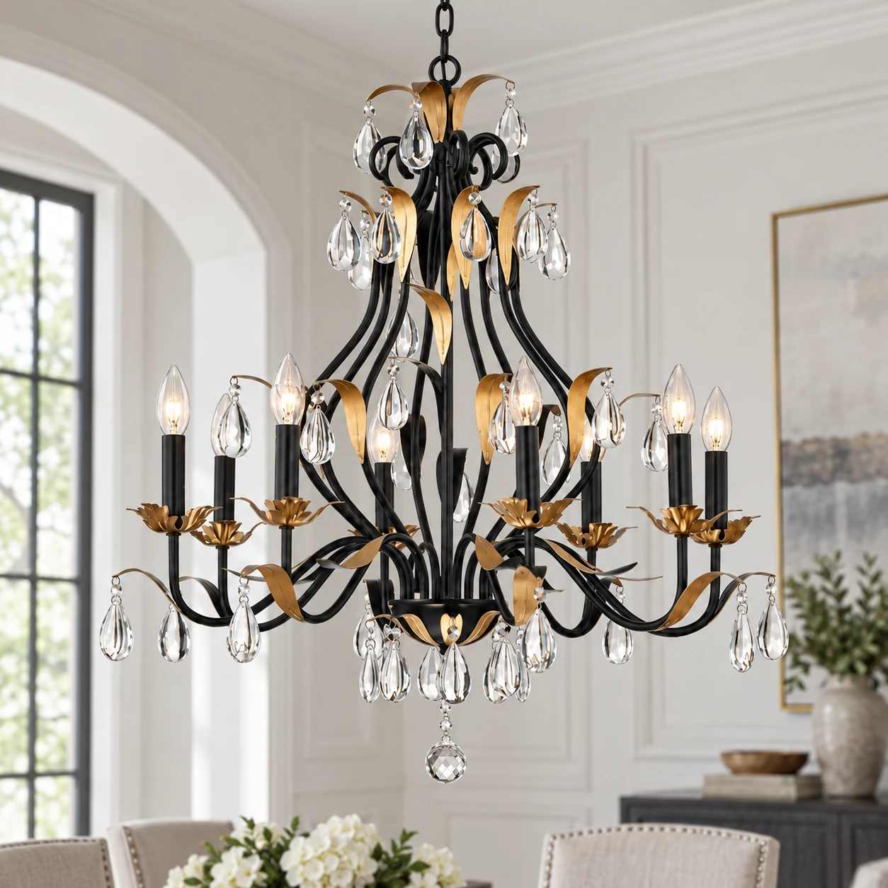 Matte black chandelier branches with gold accents and clear crystal drops