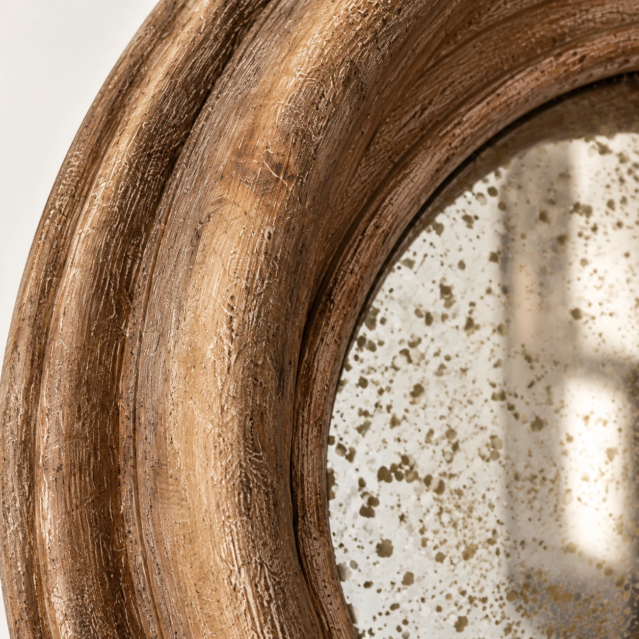 Close view of the carved natural wood frame