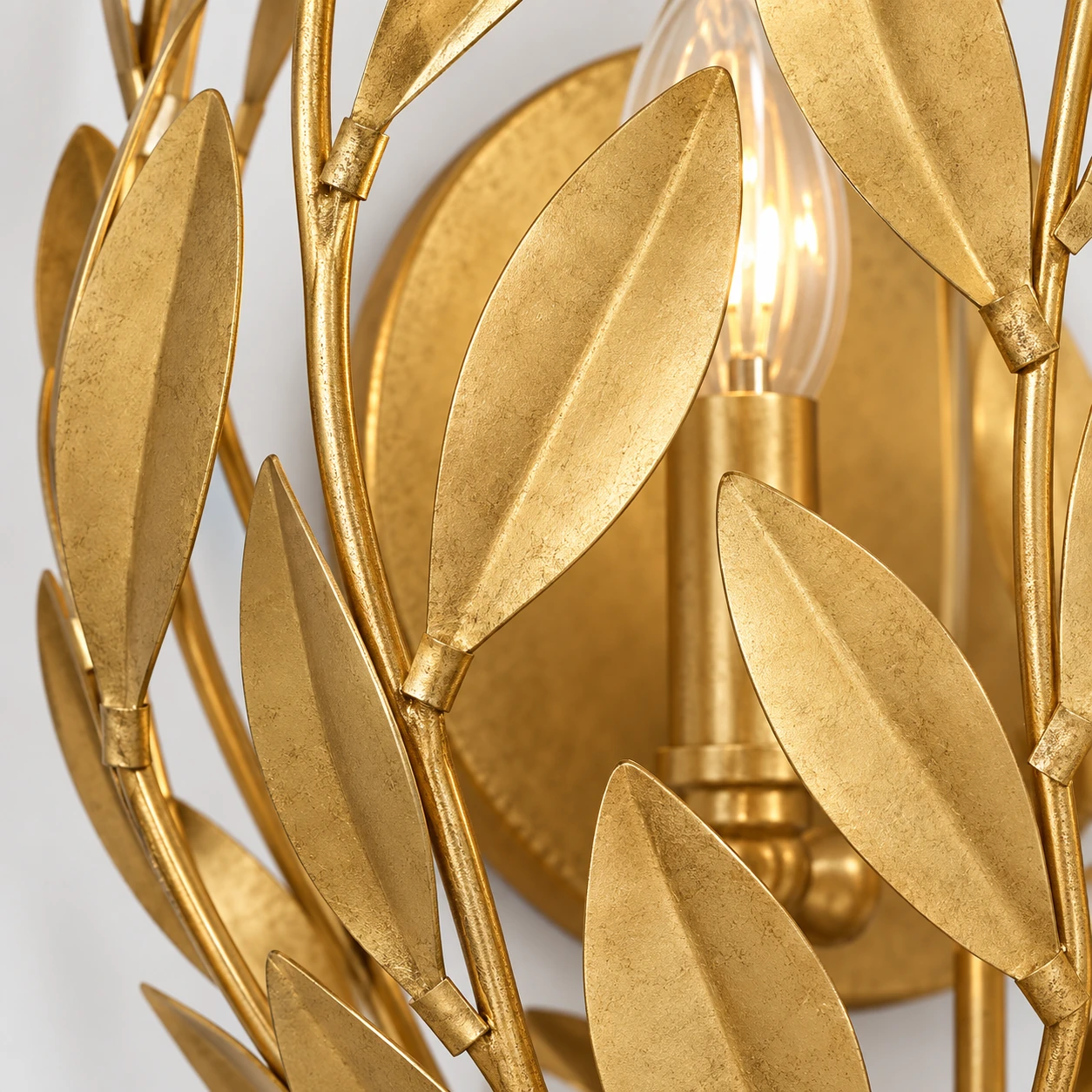 Gold Foil wall sconce leaf finish and branching detail
