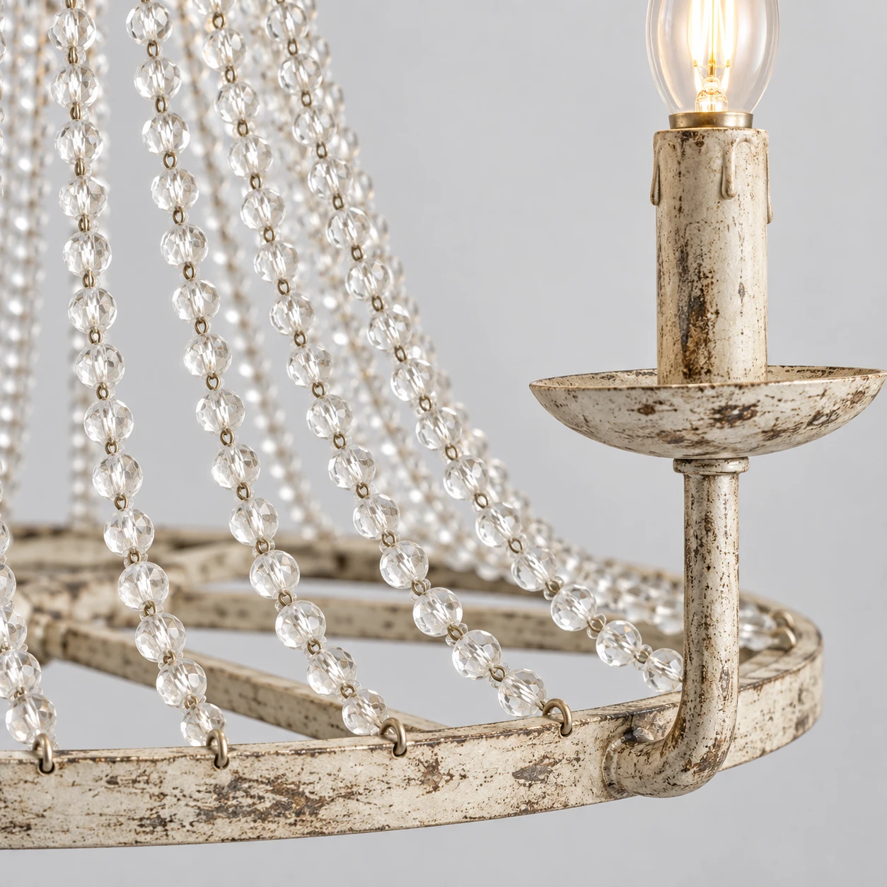 Distressed off-white iron and clear crystal bead detail
