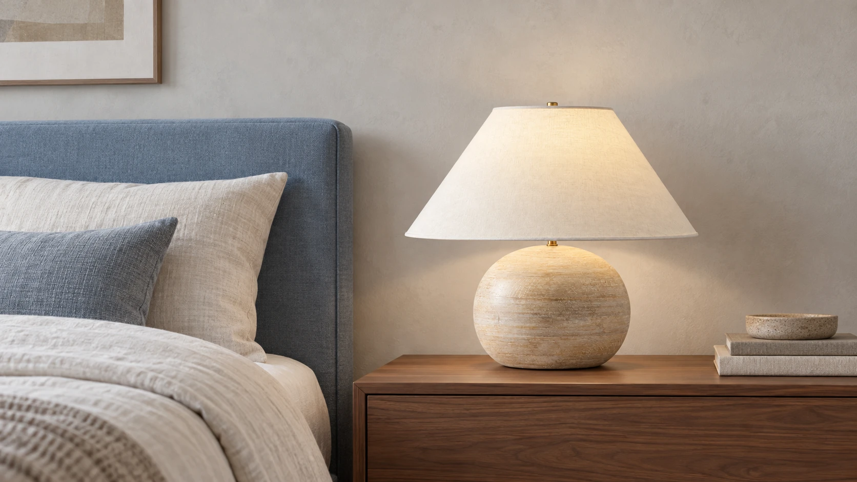 Distressed wood table lamp on a bedroom bedside cabinet