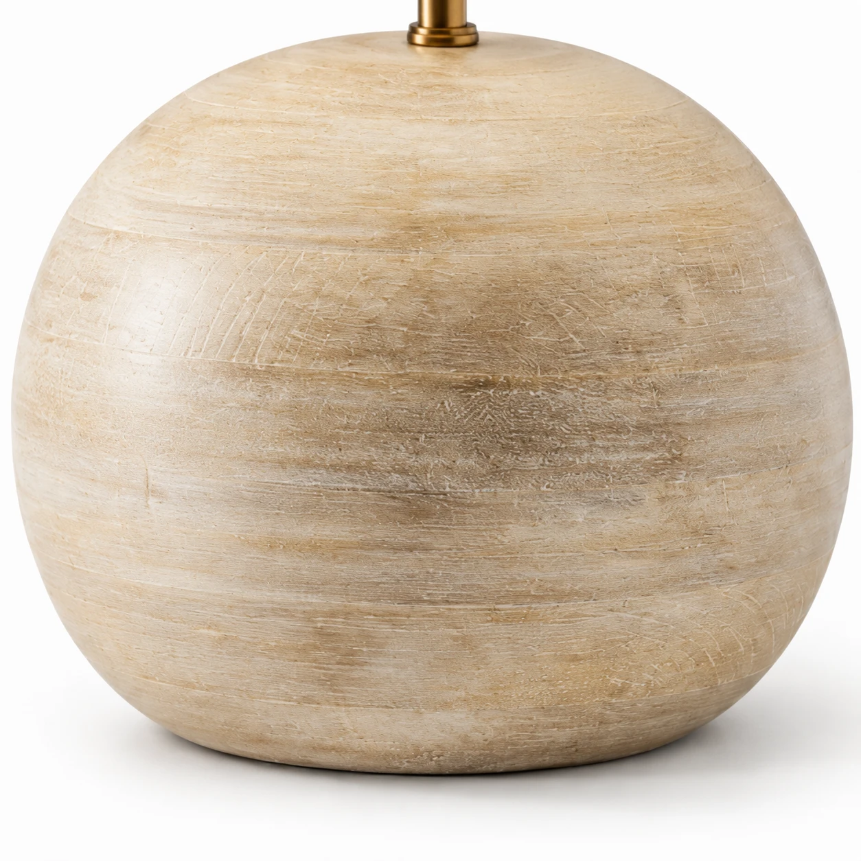 Close detail of the distressed natural-wood lamp body