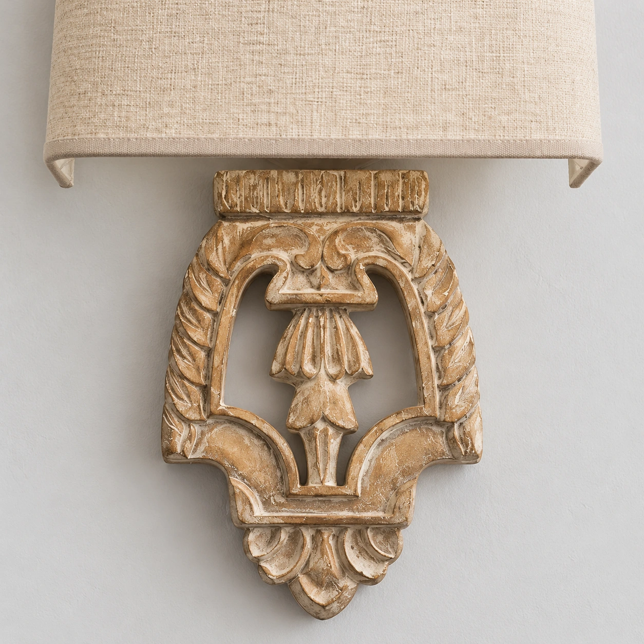Shade-to-relief junction and carved upper body of the Amelie wall light
