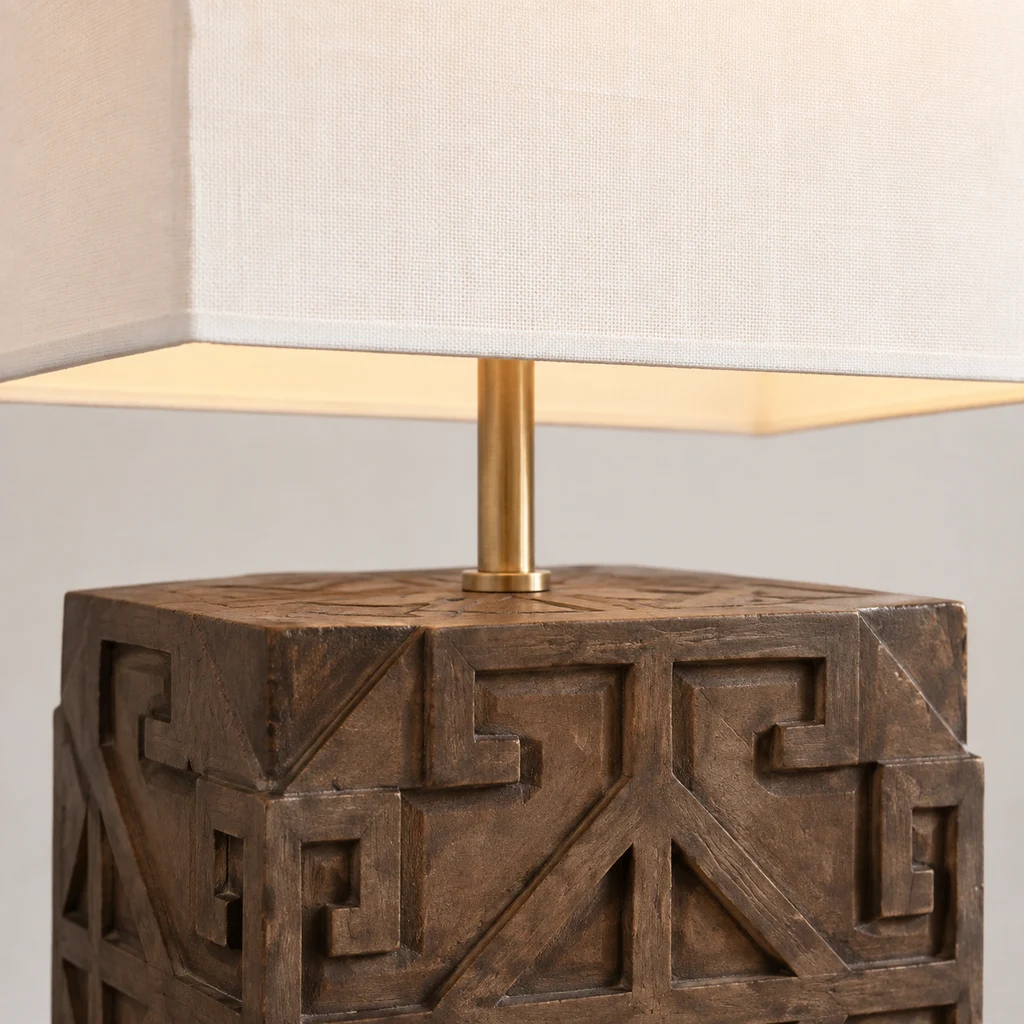 Close detail of the Aurelia lamp fabric shade, brass stem and wood base
