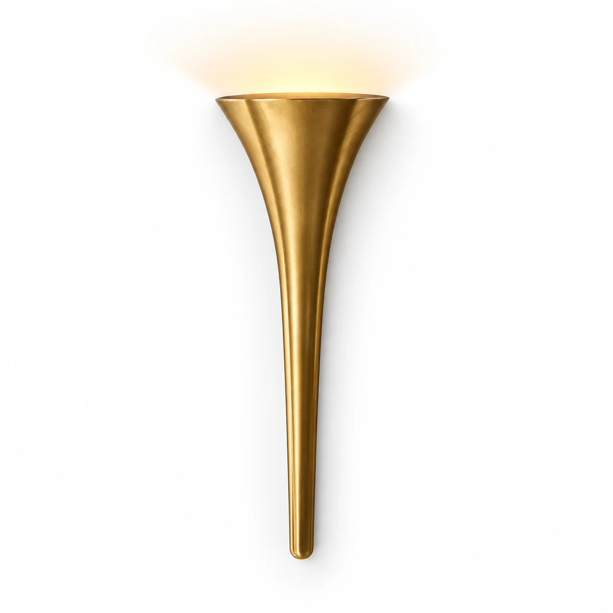 Brass wall sconce casting an upward glow in a residential setting