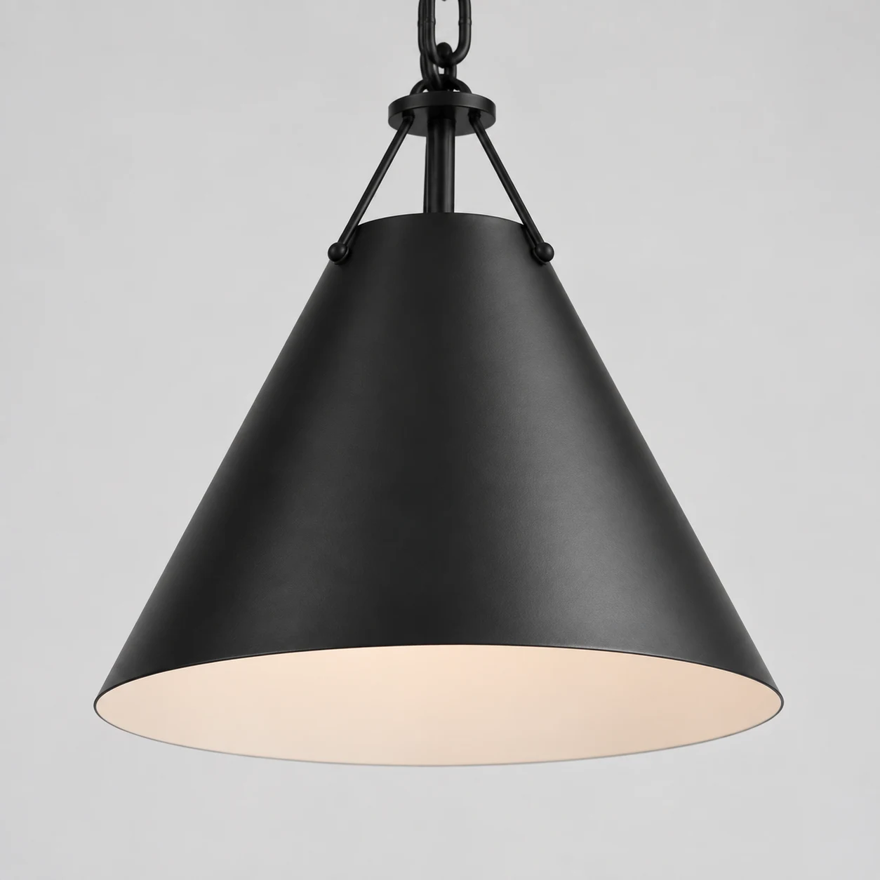 Smooth matte-black iron cone shade rim and pale interior