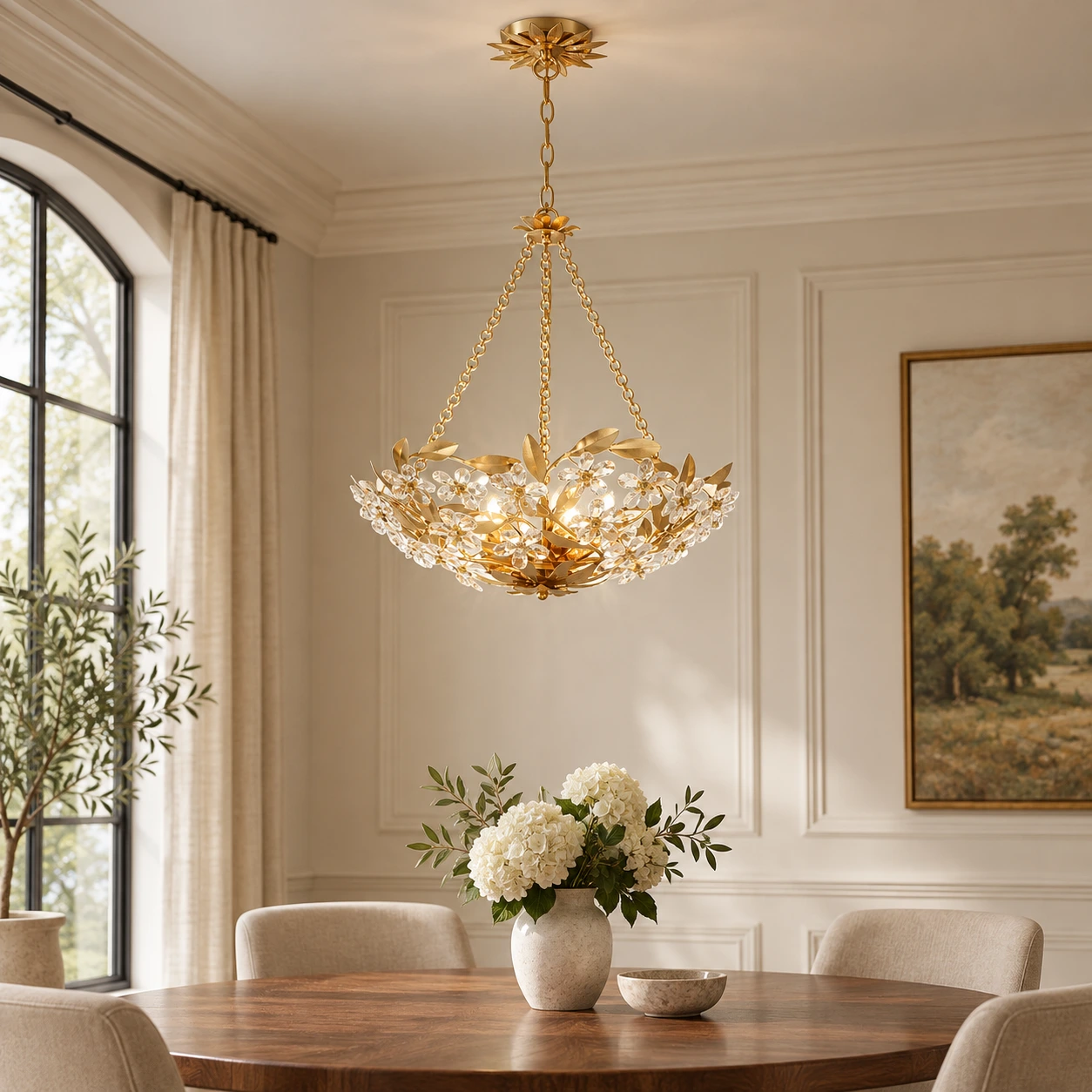 Crystal flower pendant light above a round dining table