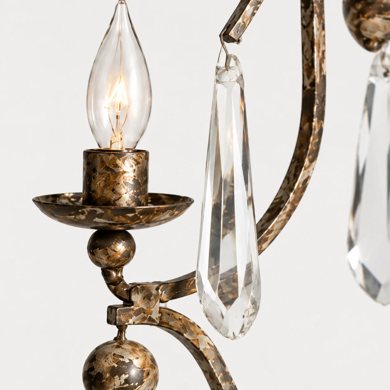 Close detail of a clear faceted crystal drop