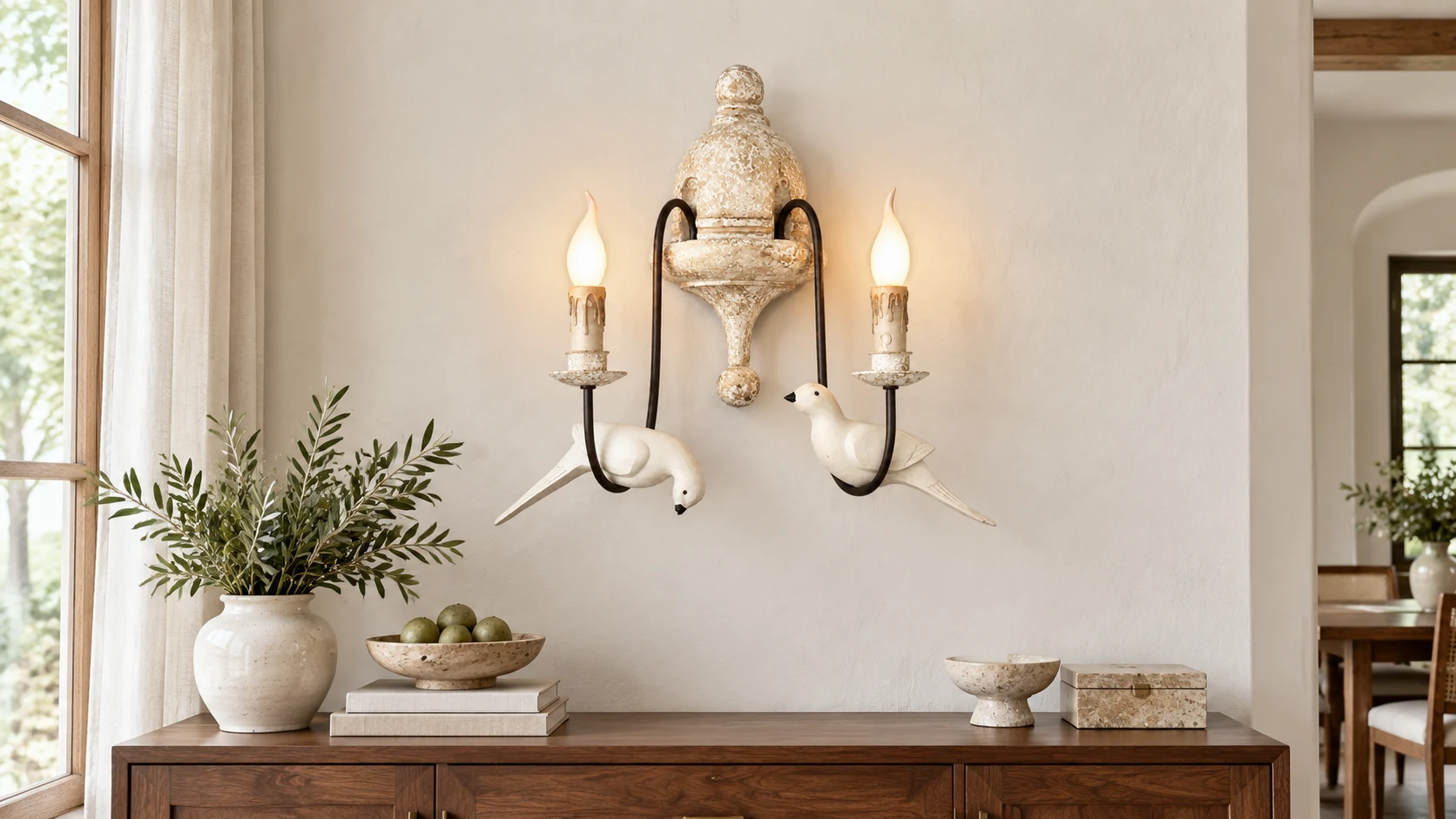 Mara double-head bird wall light above a residential dining room sideboard