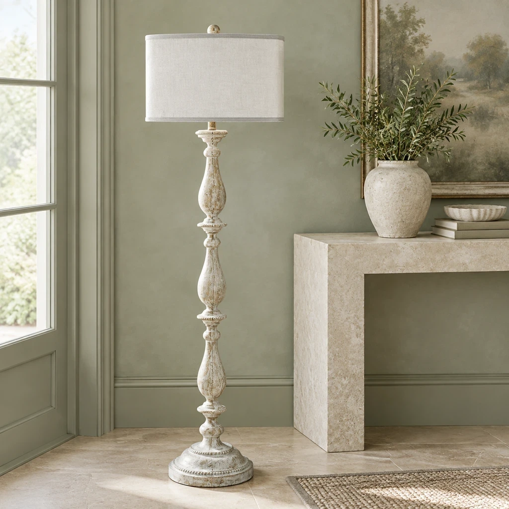 French Rustic Carved Wood Floor Lamp above a pale limestone console
