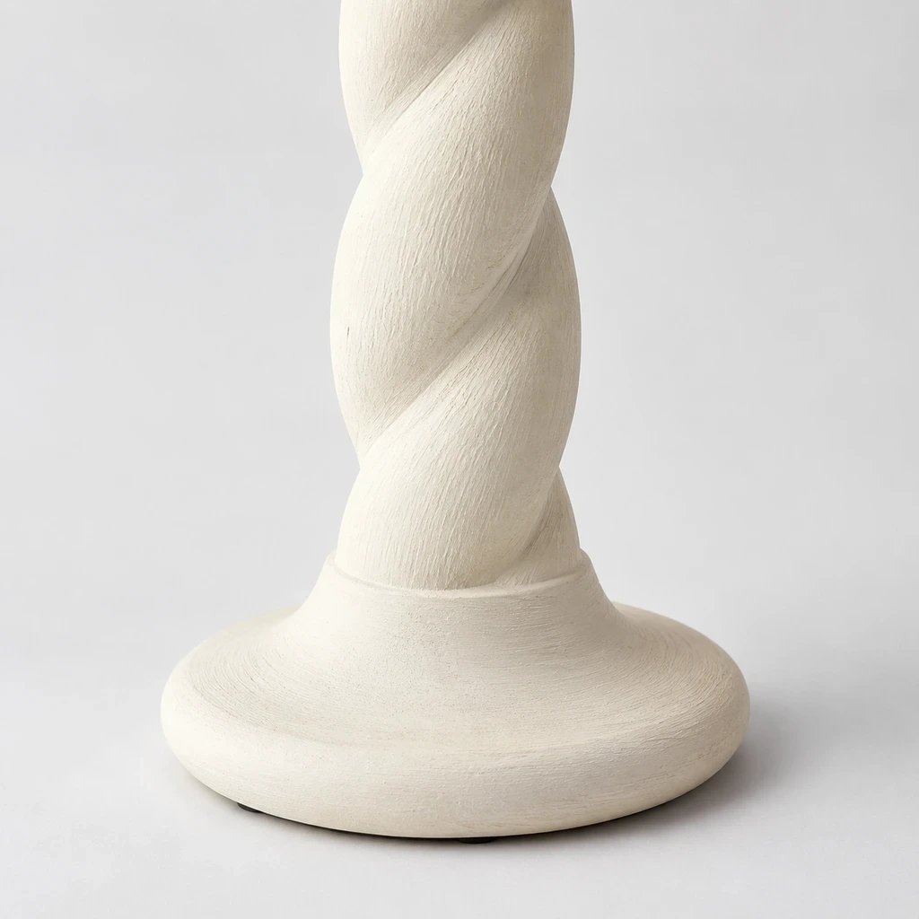 Carved wood column and rounded table lamp base detail