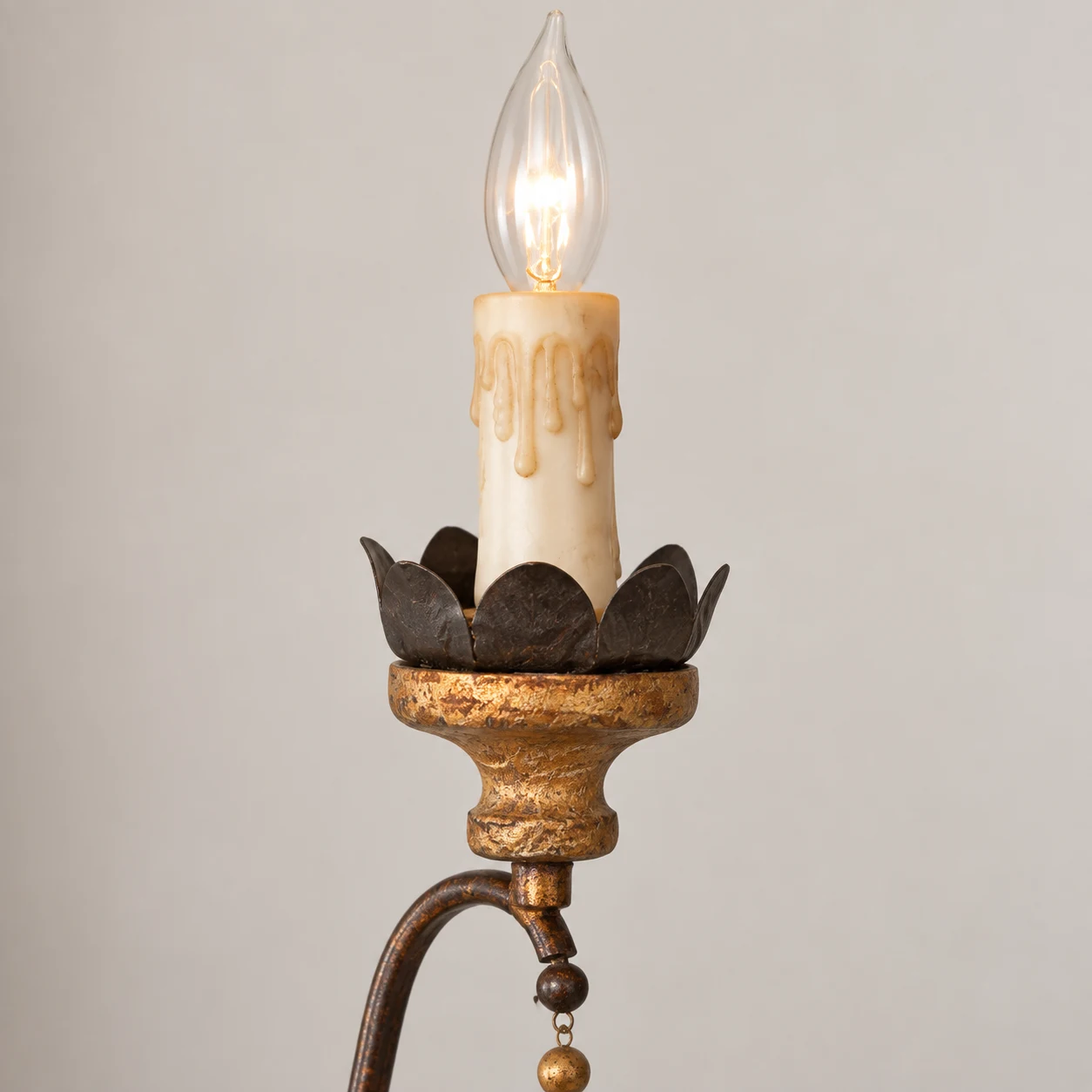 Candle-style bulb, wax-drip sleeve and lotus-petal bobeche