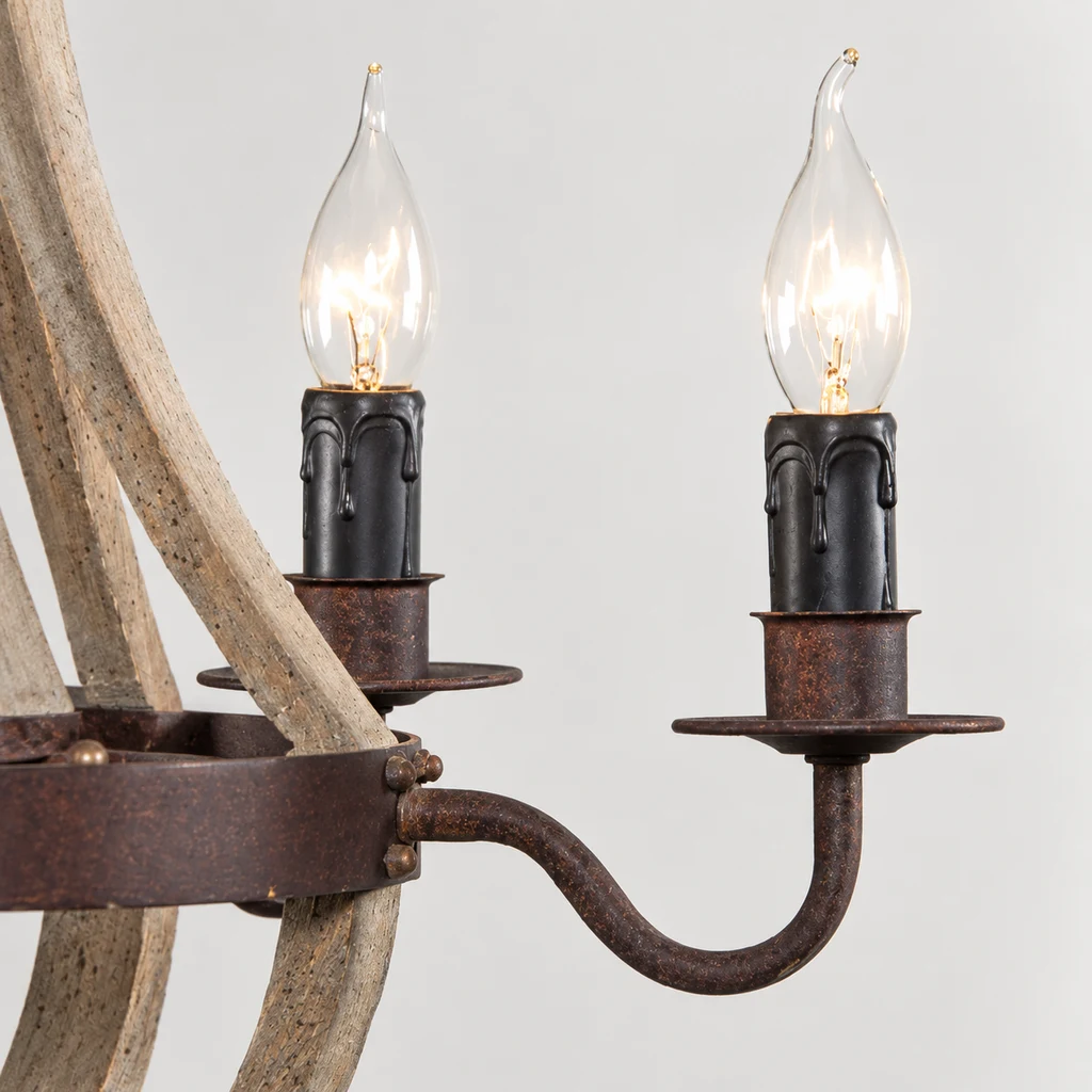 Close detail of Elowen chandelier rust-brown iron arm and candle-style socket