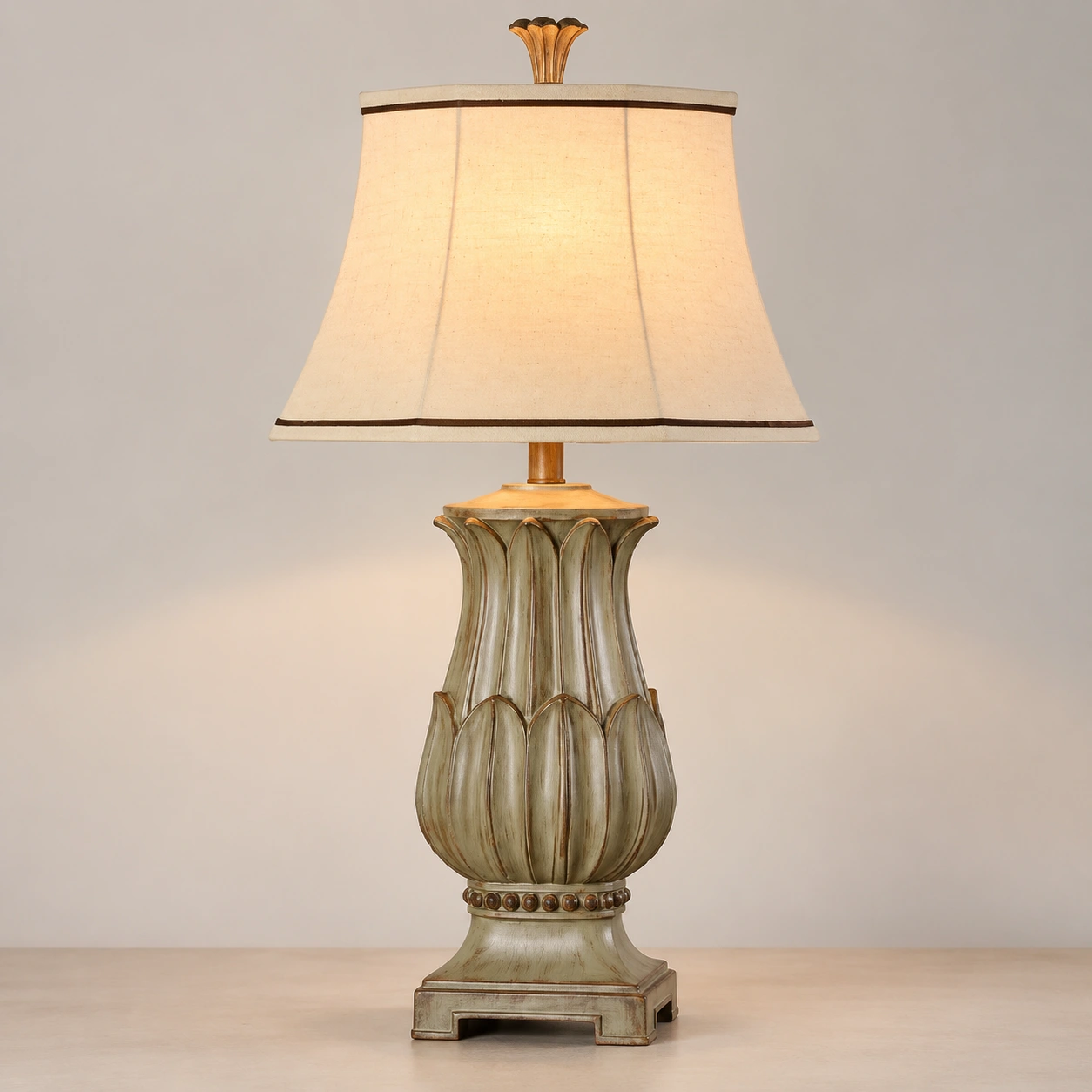 Antique gray-green carved wood body detail of the Marlowe table lamp