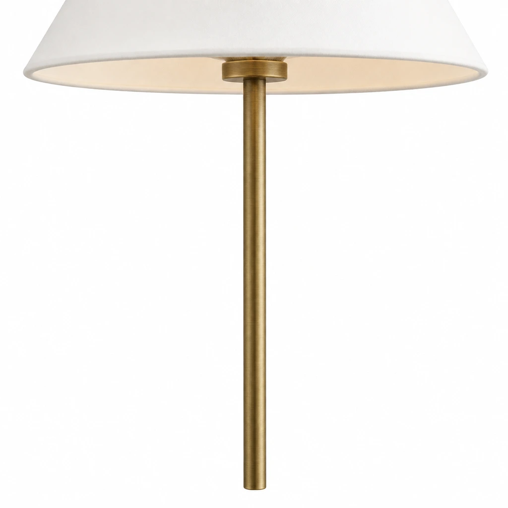 Close view of the long slender antique brass stem