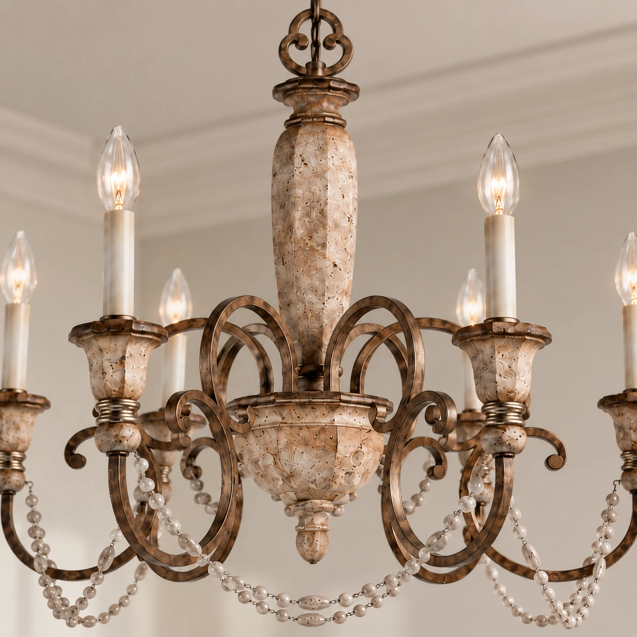 Carved wood center, iron scroll arms, and crystal bead detail