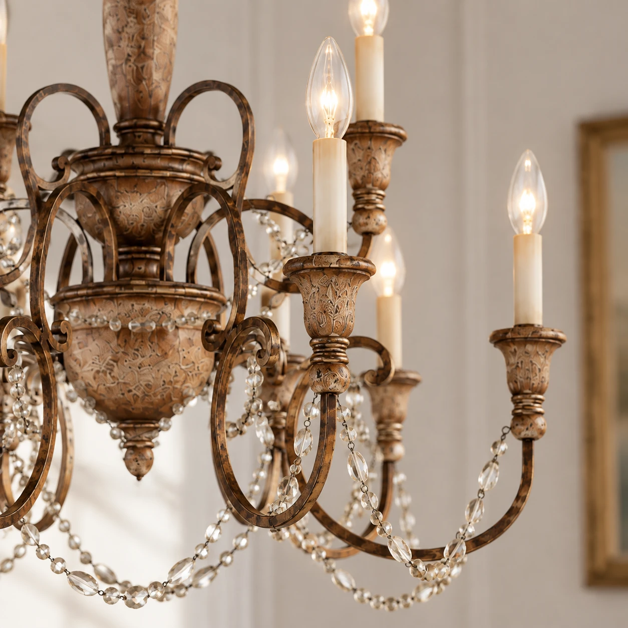 Candle-style E14 light heads and curved iron arms detail