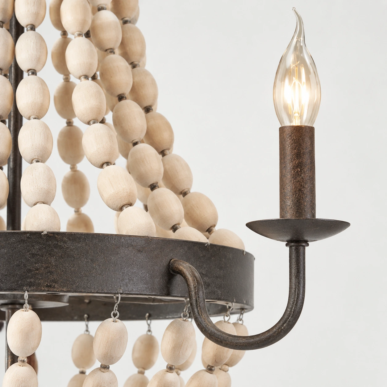 Candle-style socket and iron arm detail
