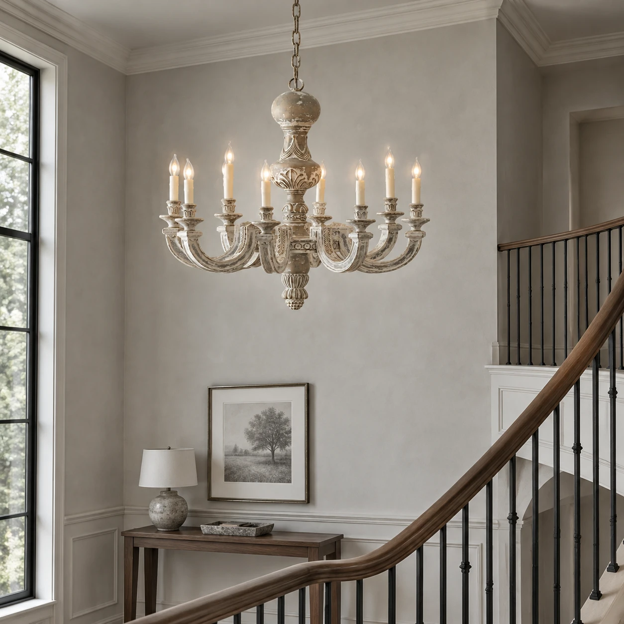 Eight-light wood chandelier over a stair landing