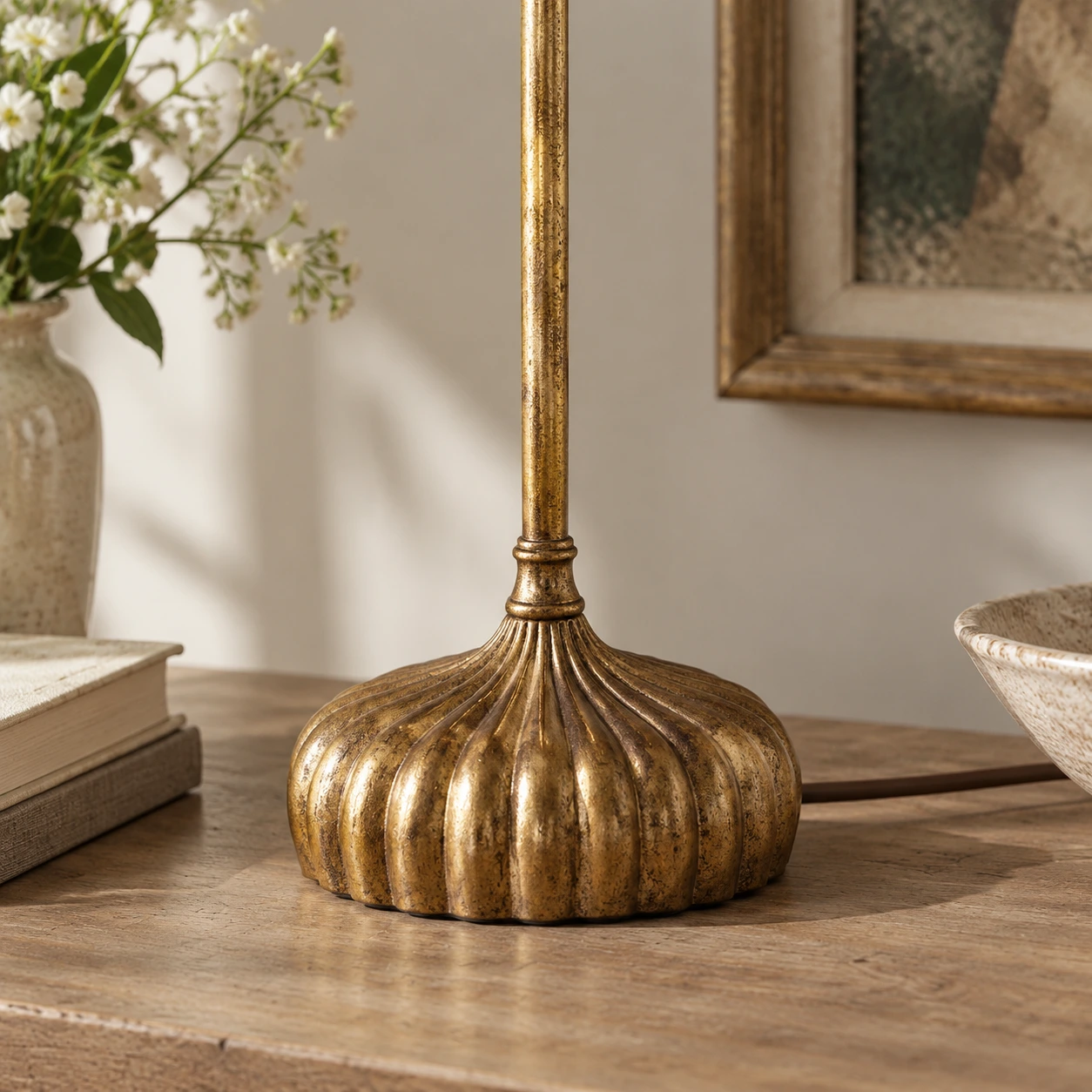 Fluted distressed iron base detail