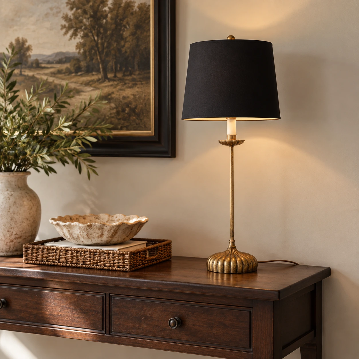 Black shade table lamp on a console
