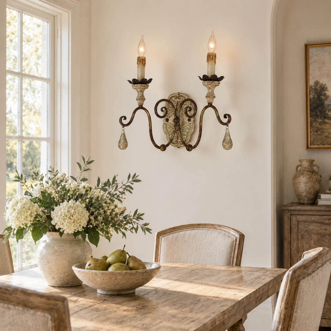 Two-light wall sconce beside a family dining table
