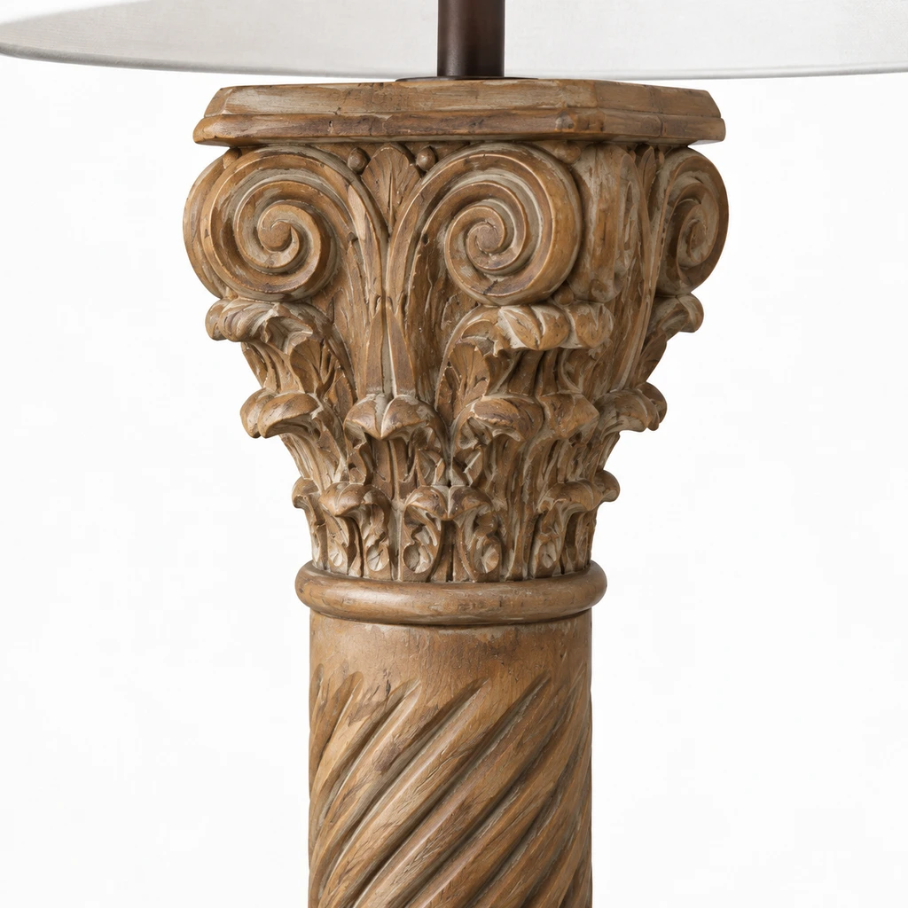 Close detail of the carved wood capital and scrolls