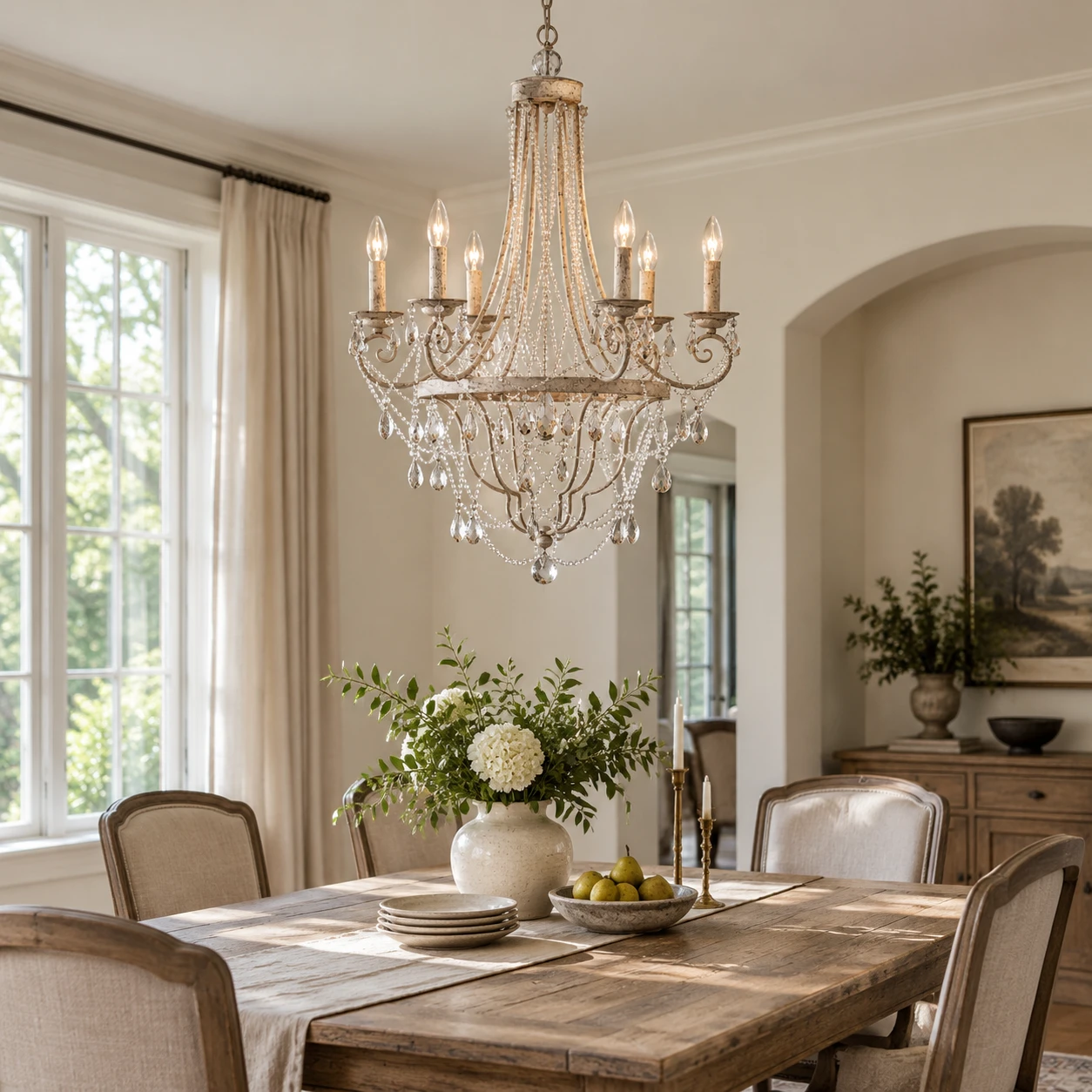 Maeve crystal iron chandelier above a residential dining table