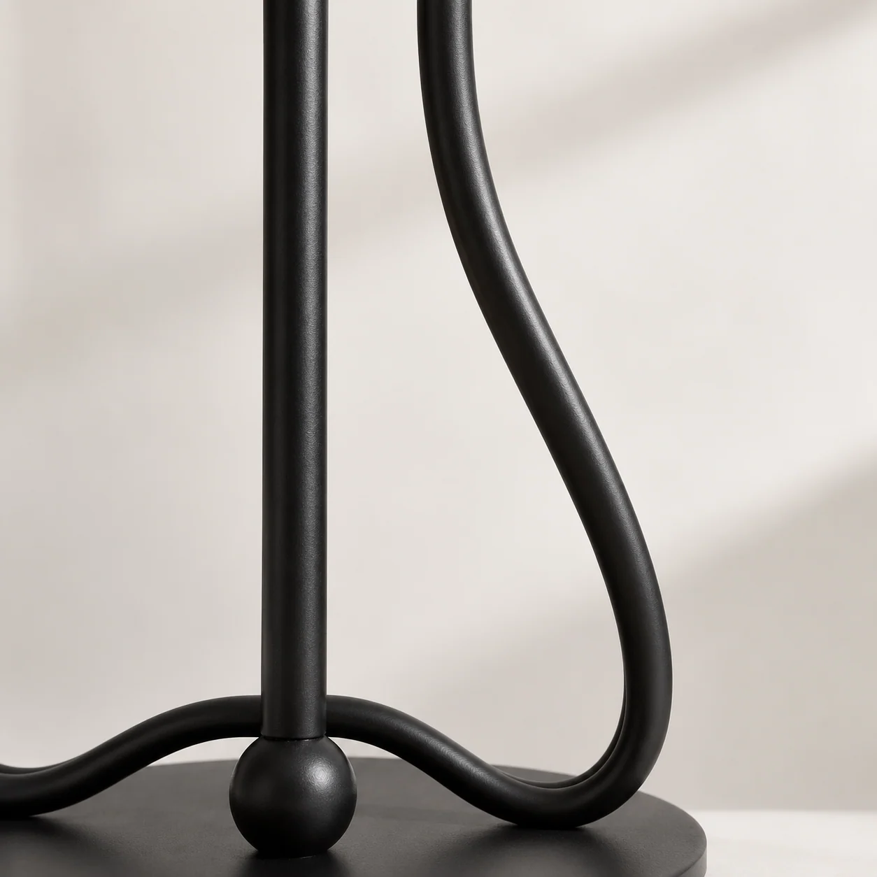 Curved matte black iron stems