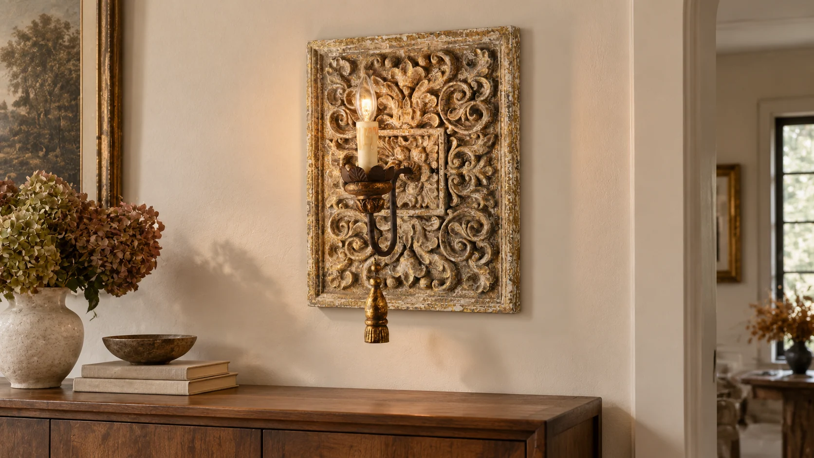 Carved wooden wall sconce above a home sideboard
