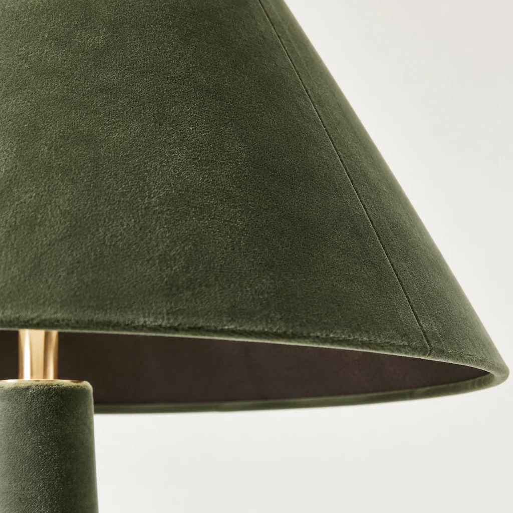 Close detail of the oil-green velvet shade edge and inner lining