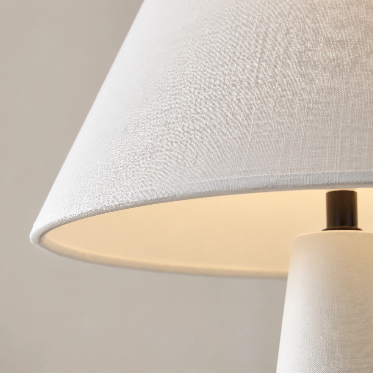 Close view of the white fabric shade edge and neck