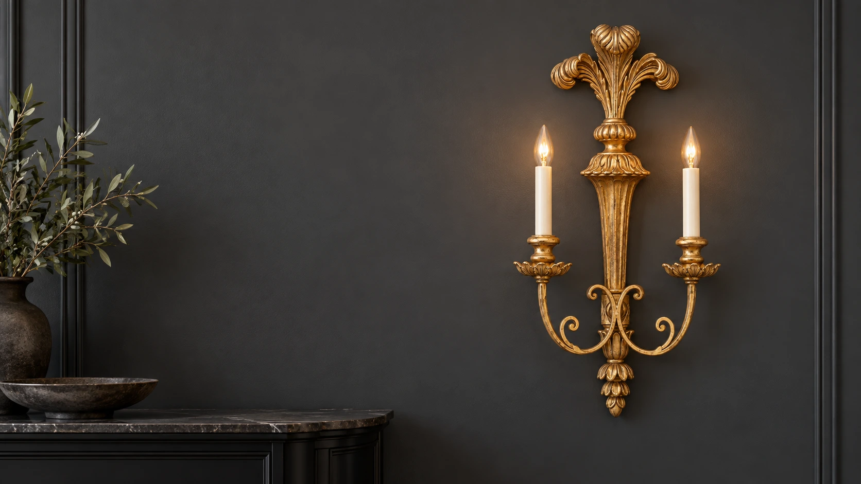 Antique gold-toned wood wall sconce in a dining room