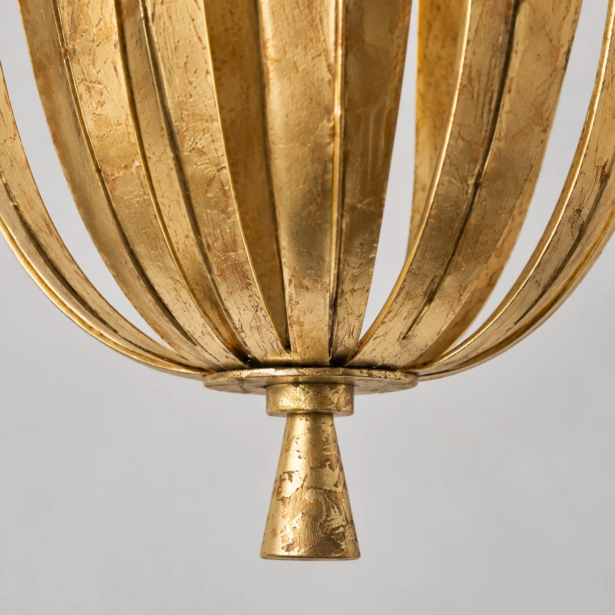 Vintage Gold Leaf metal petal convergence and lower finial detail
