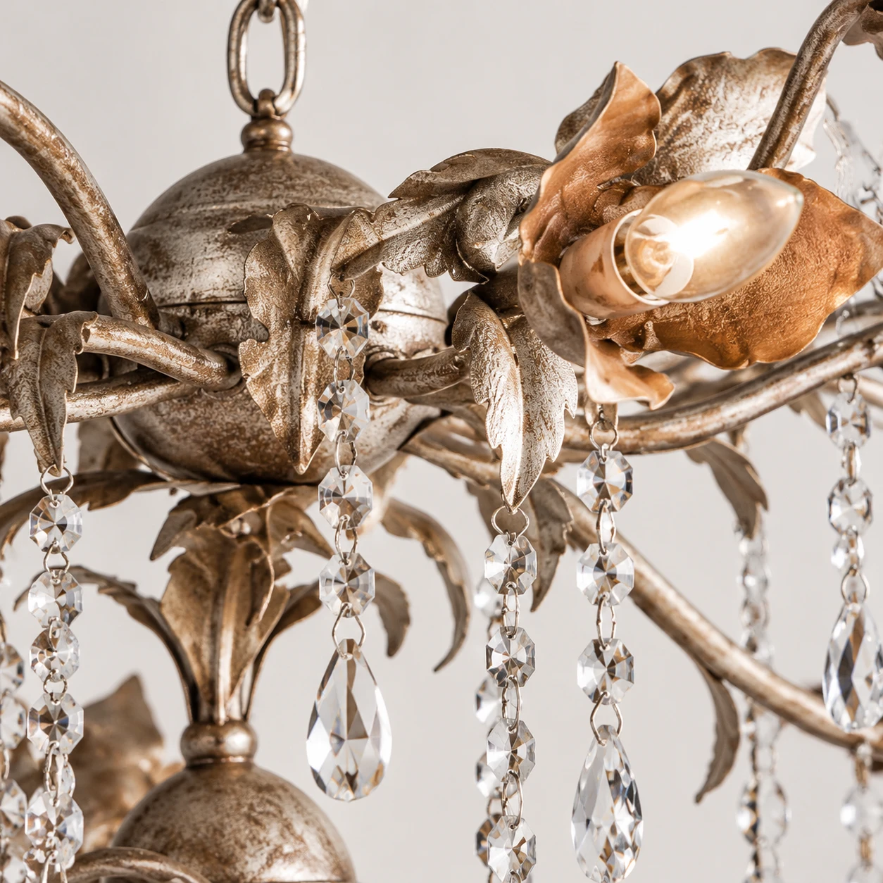 Painted iron arms and clear crystal drop detail