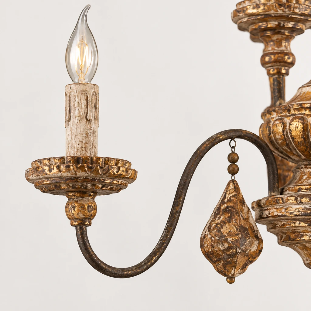 Close detail of a Marlowe curved arm and carved wood drop