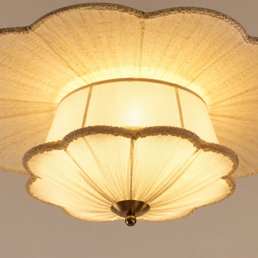 Close detail of the layered fabric diffuser and brass drop