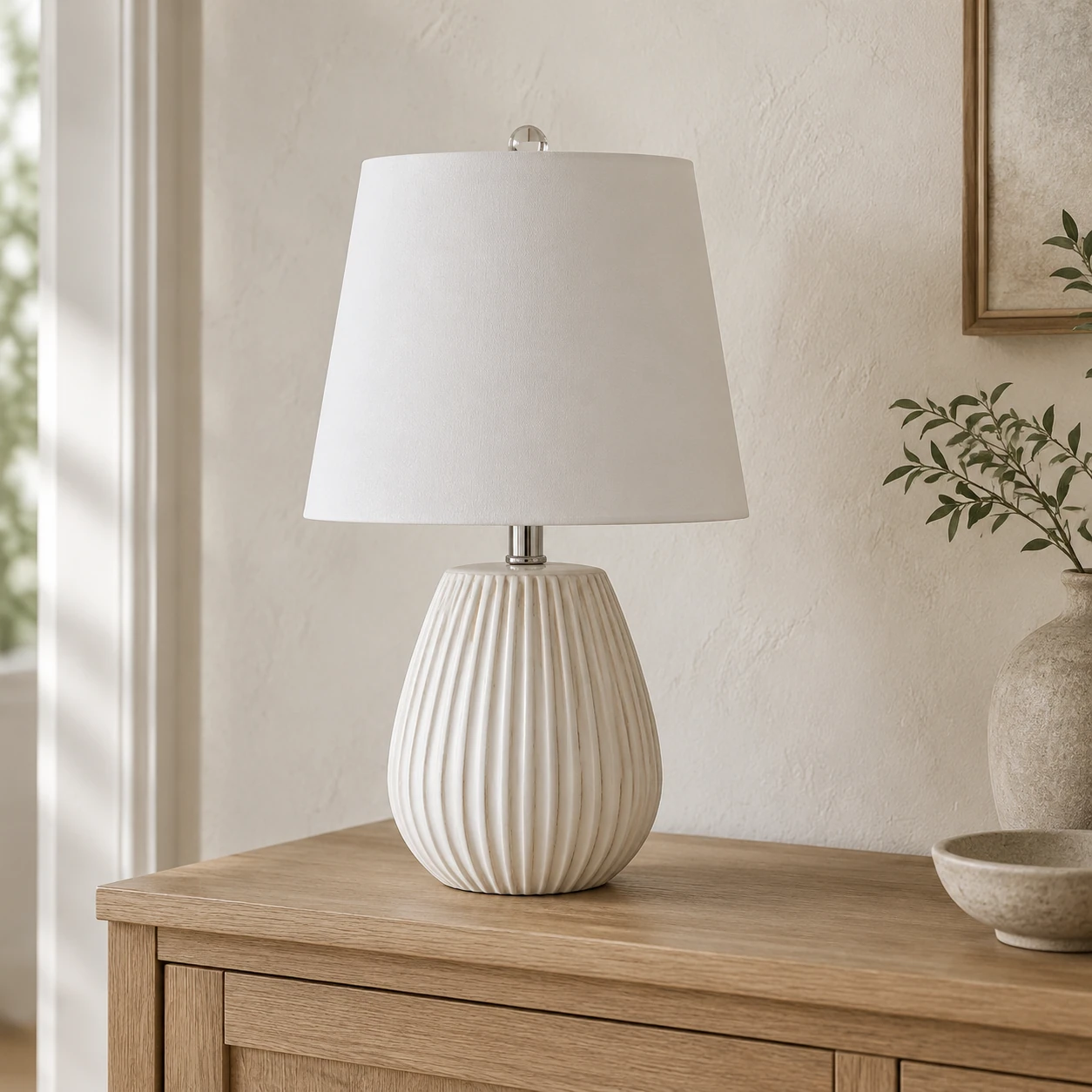 Clara table lamp on a compact entry console