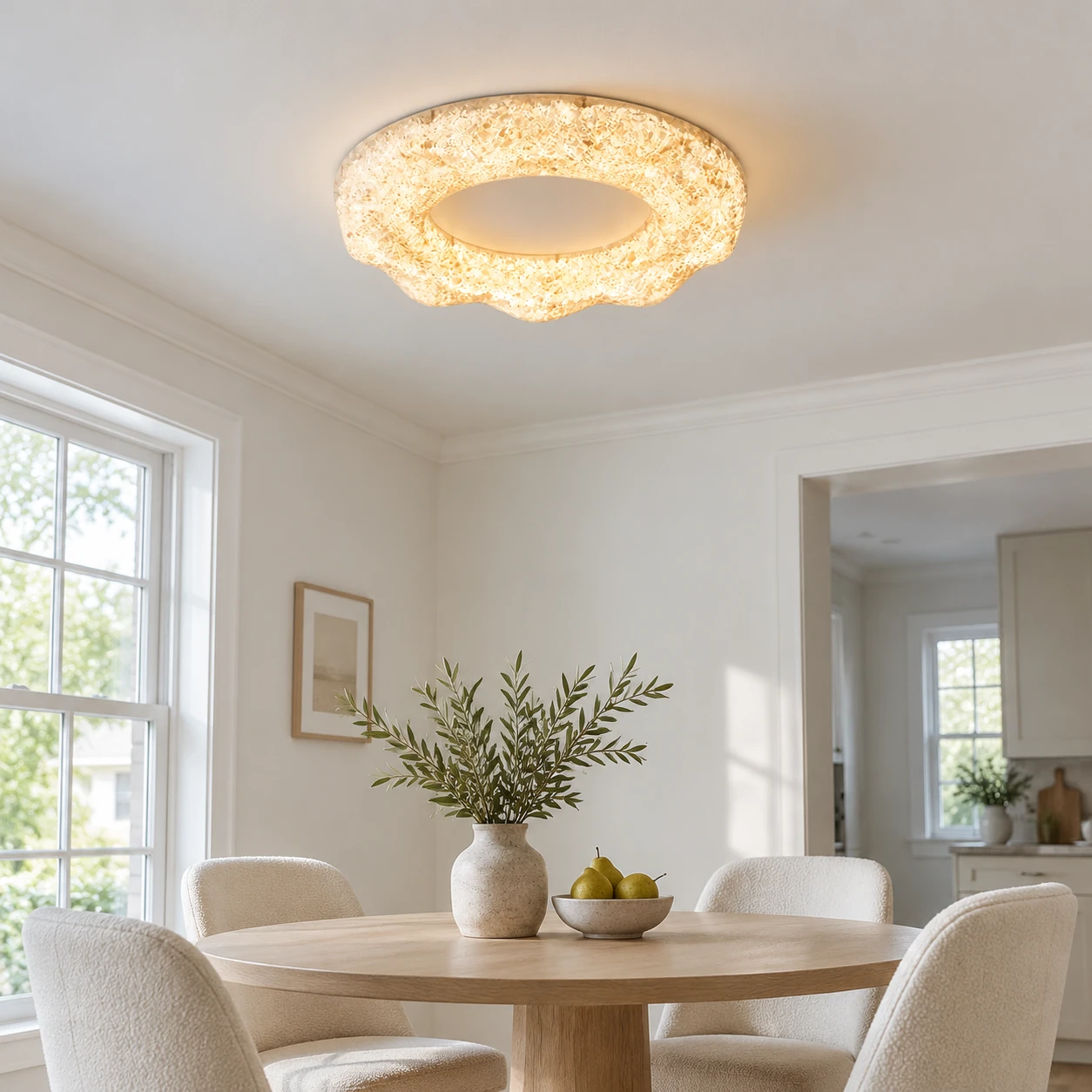 Clara flush mount ceiling light above a dining nook