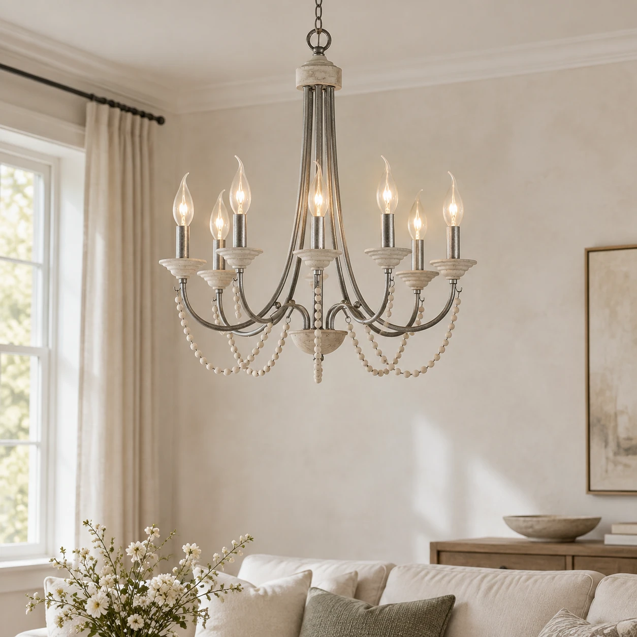 Antique silver eight-light wood bead chandelier in a living room