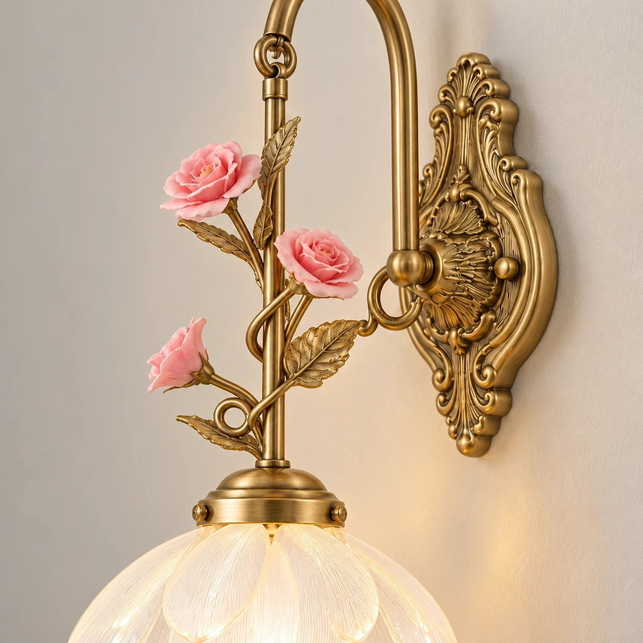 Close view of the satin copper curved arm and iron support