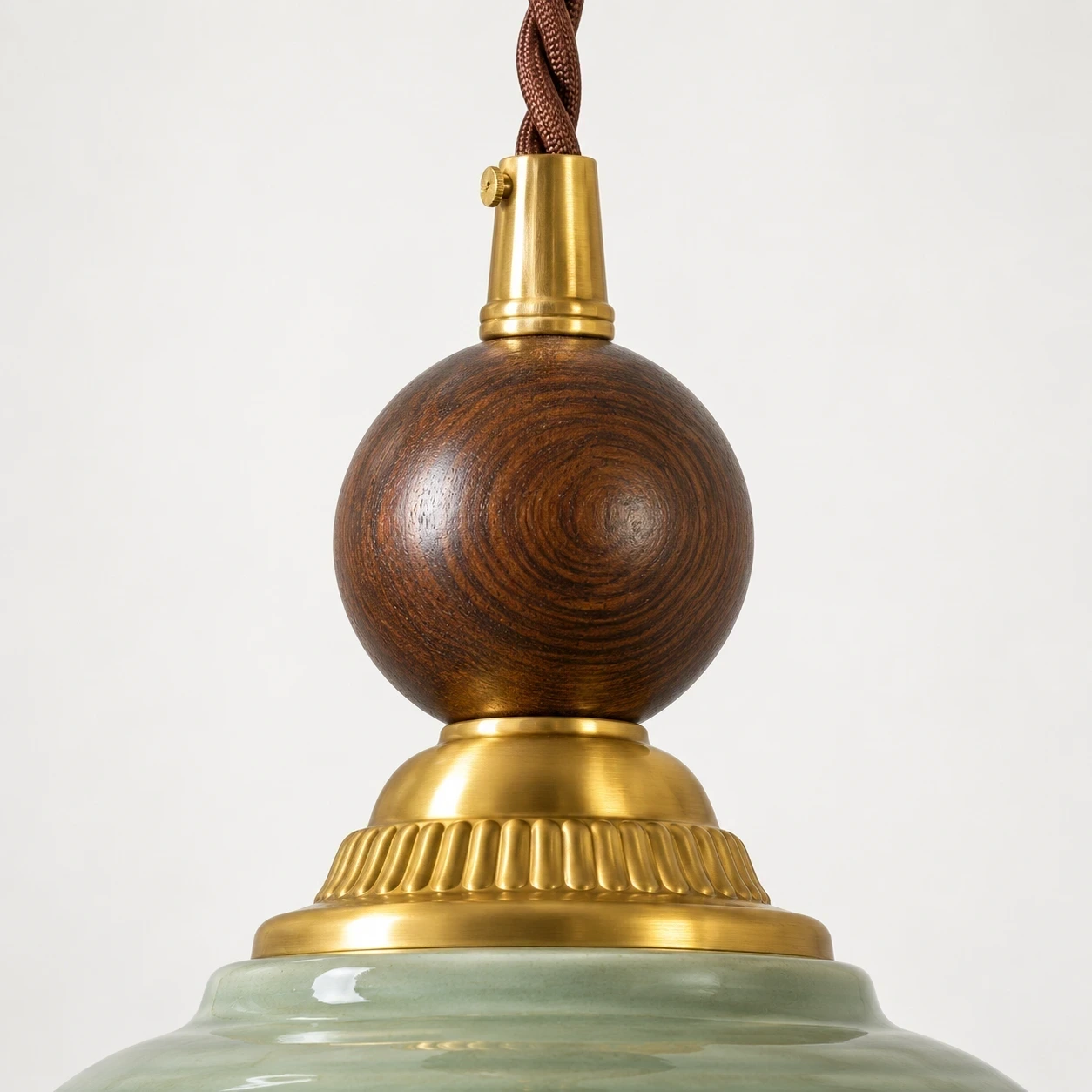 Close view of the solid-wood sphere and twisted cord junction