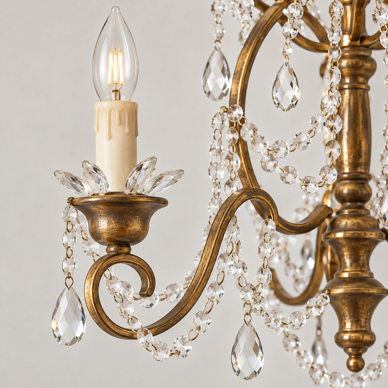 Candle-style holder and metal cup detail