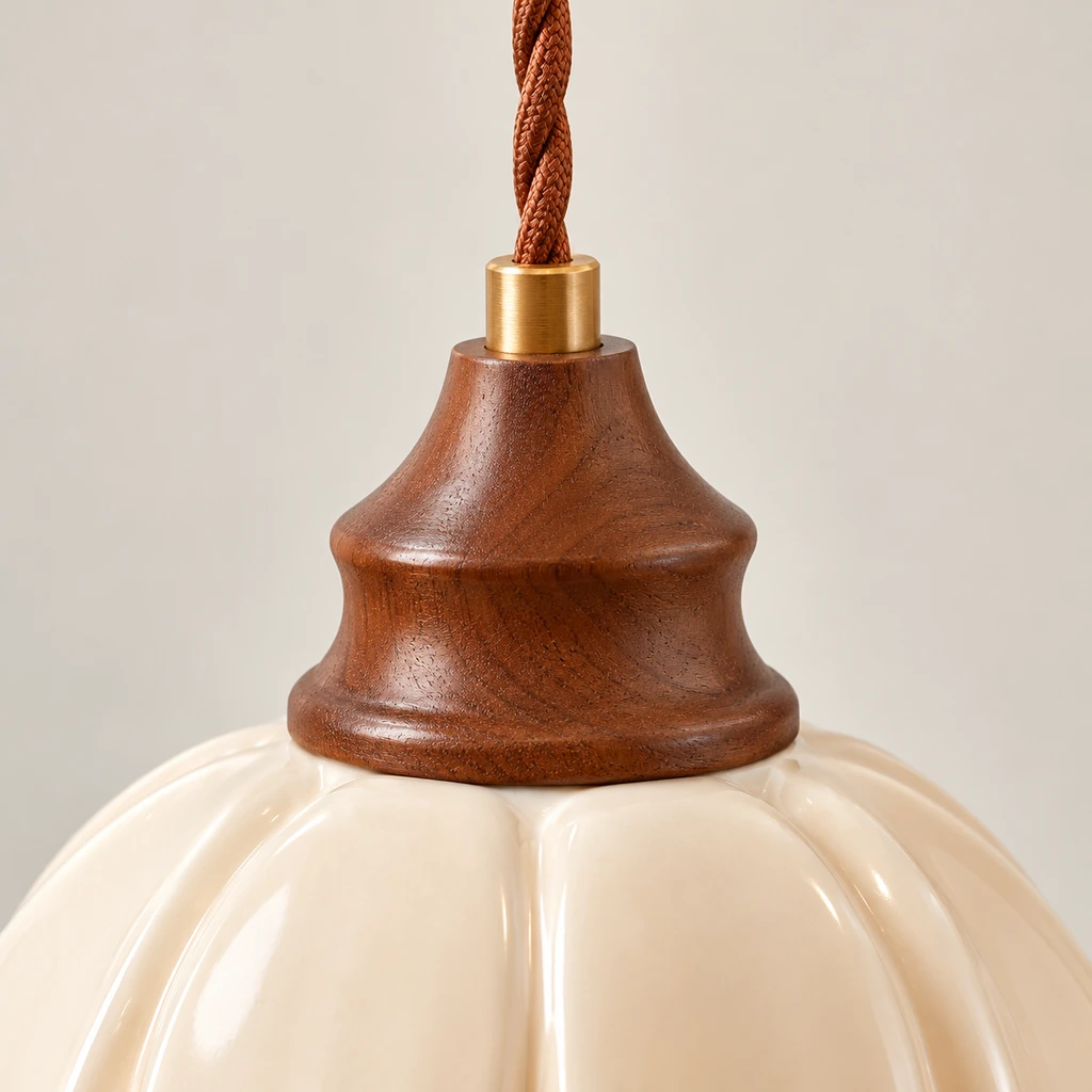 Close detail of the warm wood socket and cord