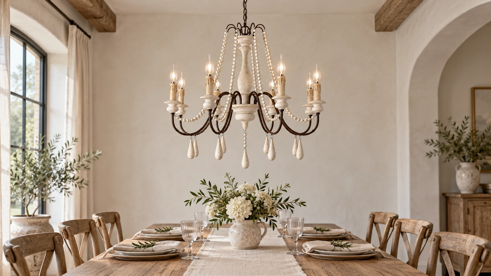 French country wood branch chandelier centered in a family dining room